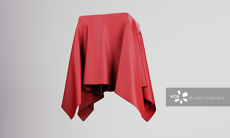 白底背景下覆盖着物体的红色布料图片素材