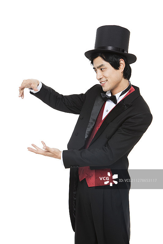 魔术师练习魔术的动态摄影图片素材