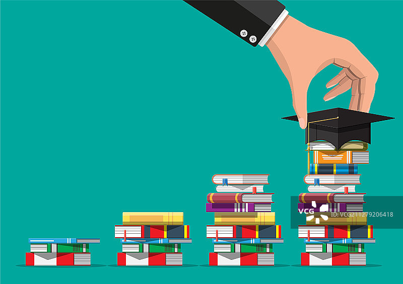 书堆上的毕业帽图片素材