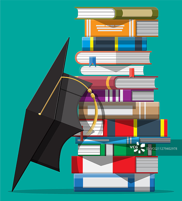 书堆上的毕业帽图片素材