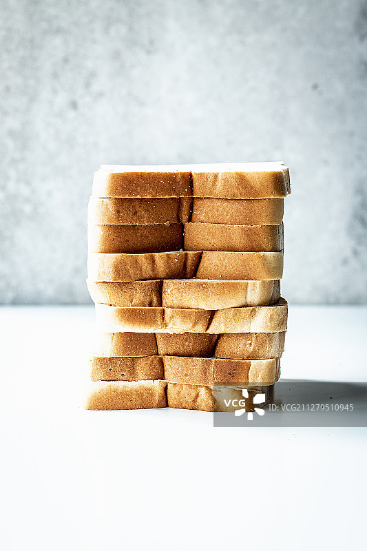 堆叠的白面包片图片素材