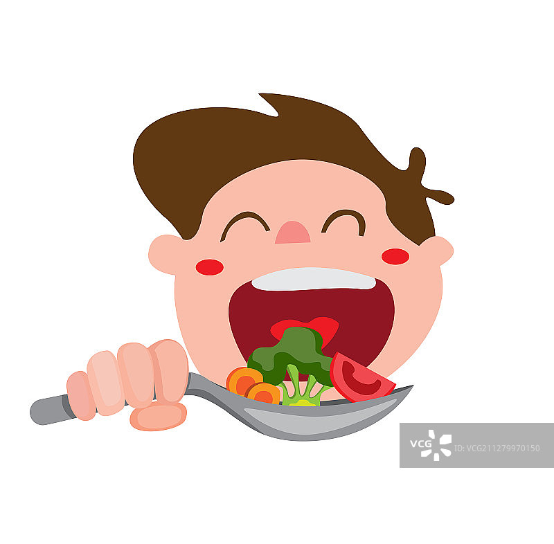 快乐的孩子吃蔬菜，男孩拿着勺子图片素材