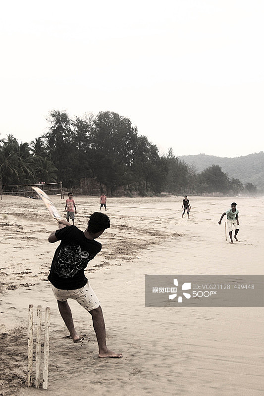 海滩板球运动员图片素材