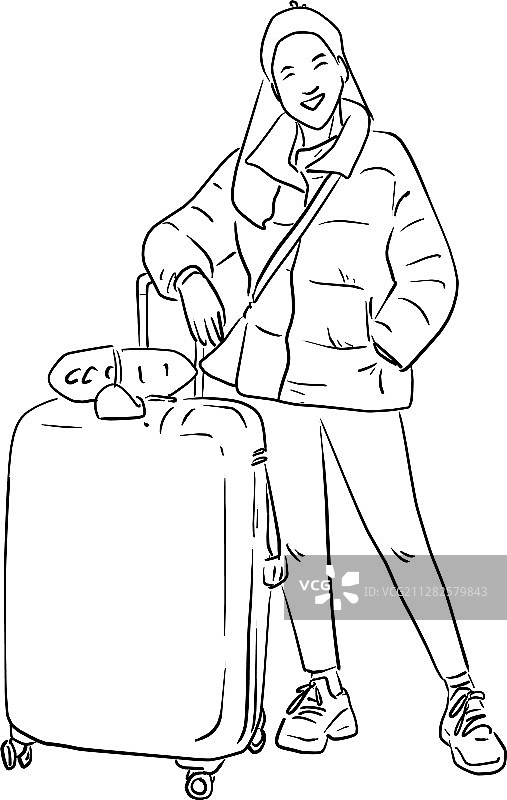 微笑的女人拉着行李箱图片素材