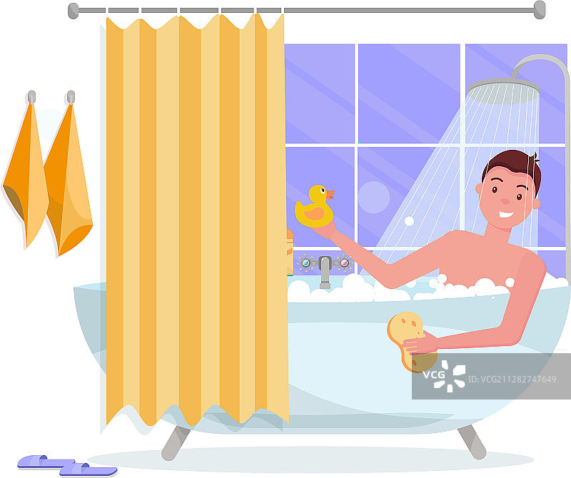 在满是泡沫的浴缸里泡澡的年轻男人图片素材