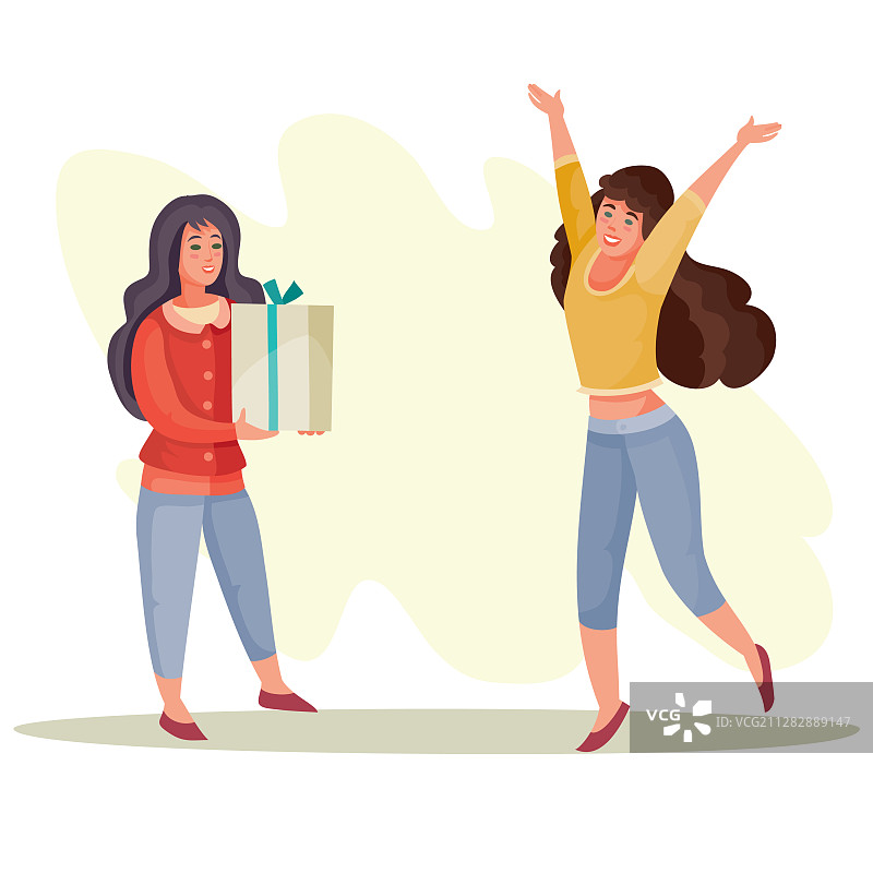 女人给女孩一个装有礼物的盒子，女孩很高兴图片素材