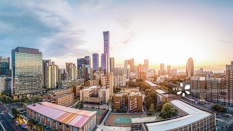 阳光照耀首都北京朝阳国贸全景落日夕阳晚霞蓝天白云广告现代城市图片素材