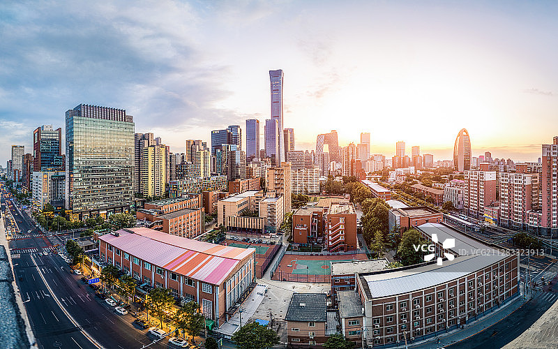 阳光照耀首都北京朝阳国贸全景落日夕阳晚霞蓝天白云广告现代城市图片素材