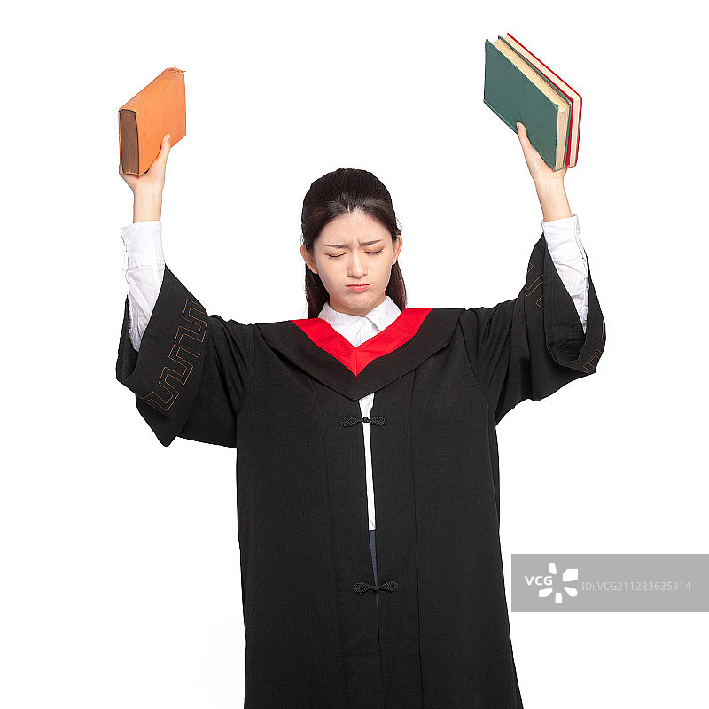 白色背景里，双手拿着书本的美丽东方美女图片素材