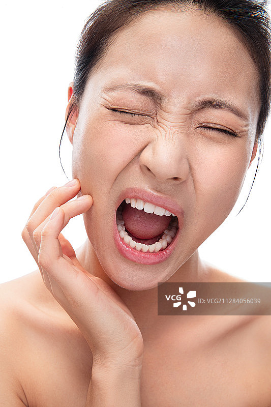 牙疼的青年女人图片素材