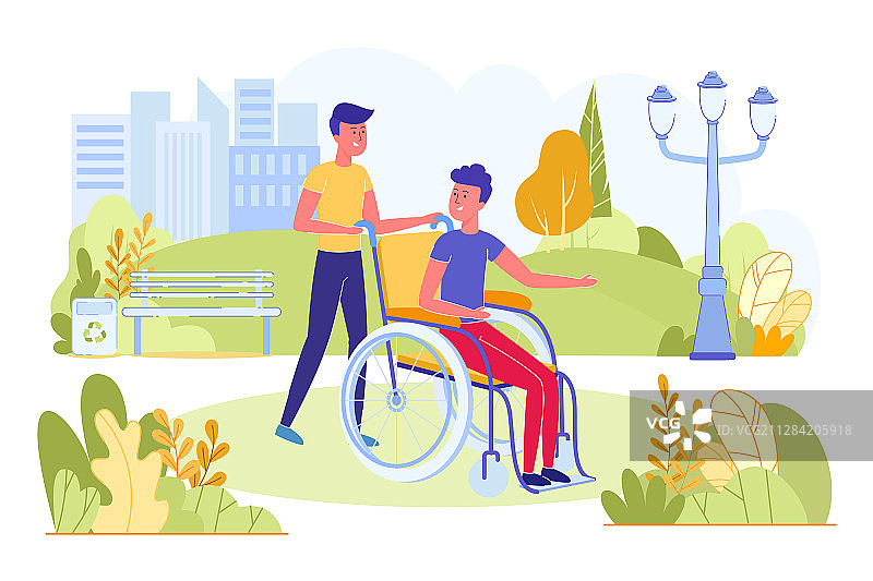 坐在轮椅上的年轻人在公园里图片素材