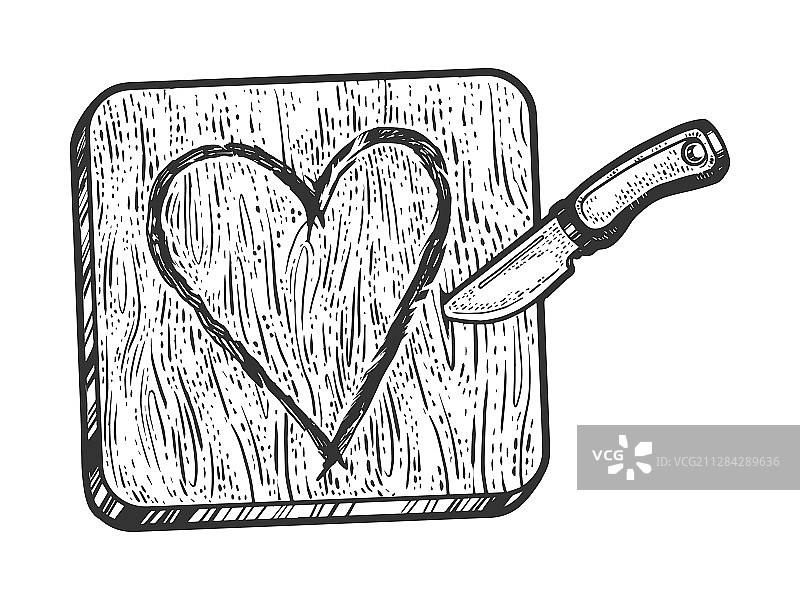 用刀在木头素描上雕刻的心形符号图片素材