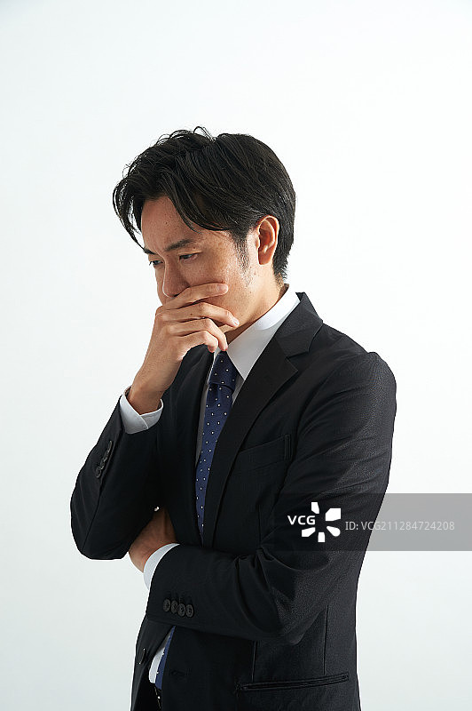 沉思中的商务男士图片素材