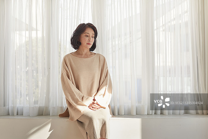 更年期、中年妇女、失眠、症状、抑郁症图片素材