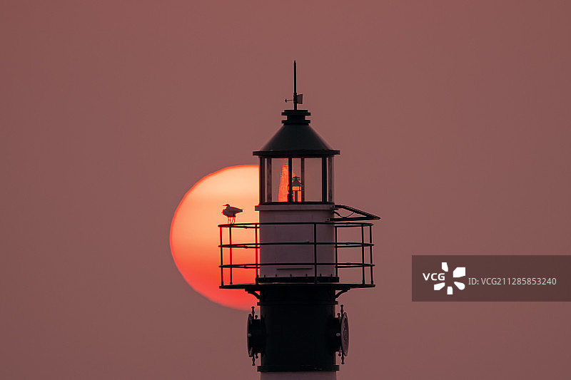 珠海九州港灯塔日出图片素材