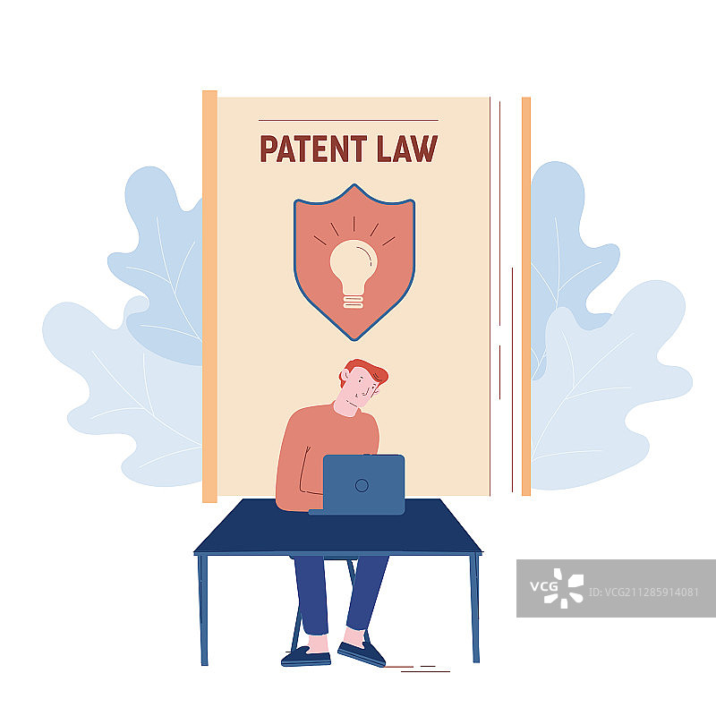 快乐的男人坐在办公桌前用笔记本电脑工作图片素材