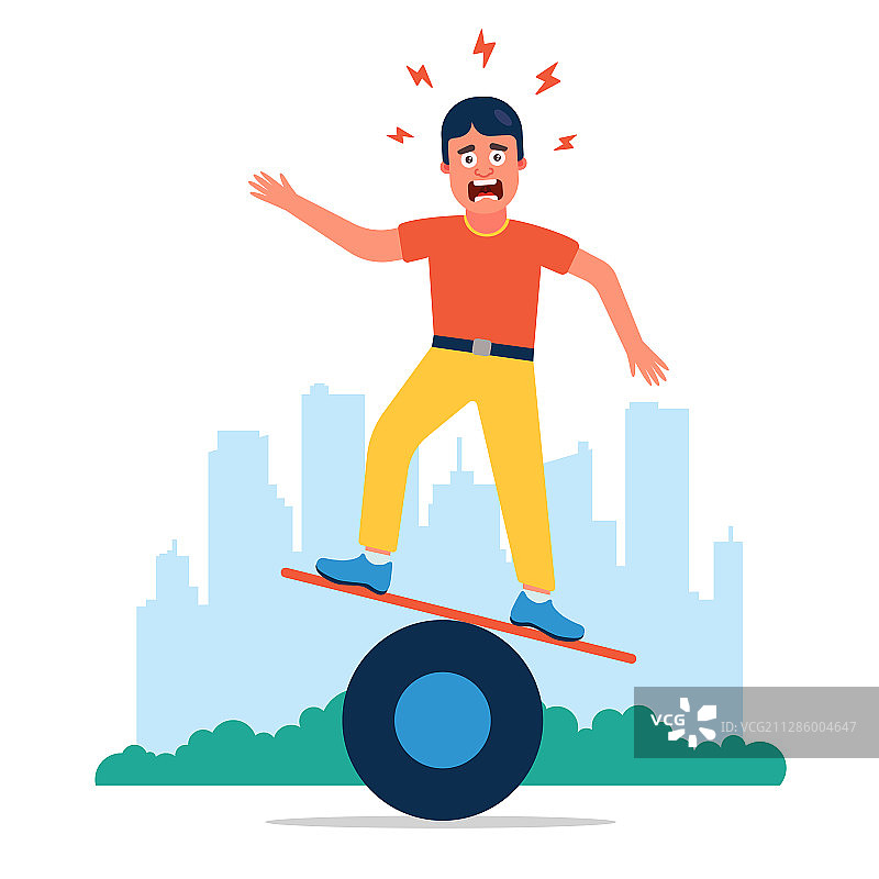 男子试图保持平衡图片素材