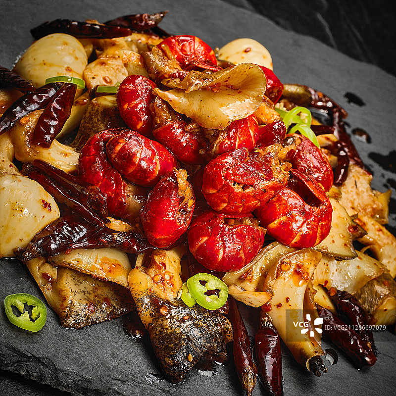 辣炒龙虾尾海螺肉图片素材