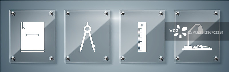 工作场所套装、台灯和打开的书、尺子图片素材