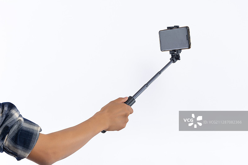 青年人拿着手机自拍图片素材