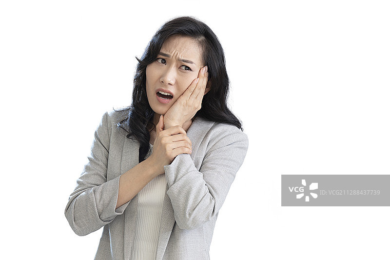 年轻商务女士牙疼图片素材