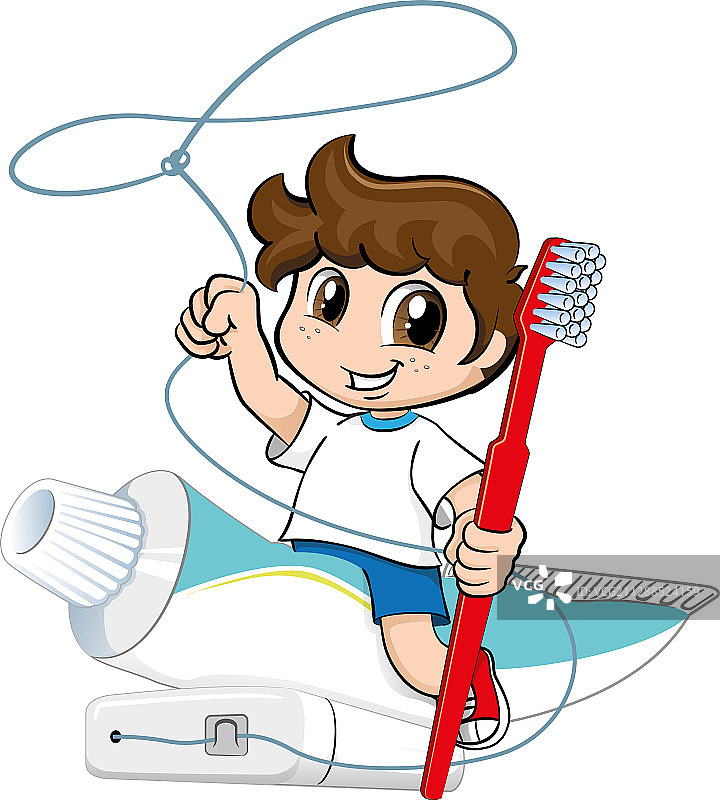 男孩骑在牙膏、牙刷和牙线的模型上图片素材