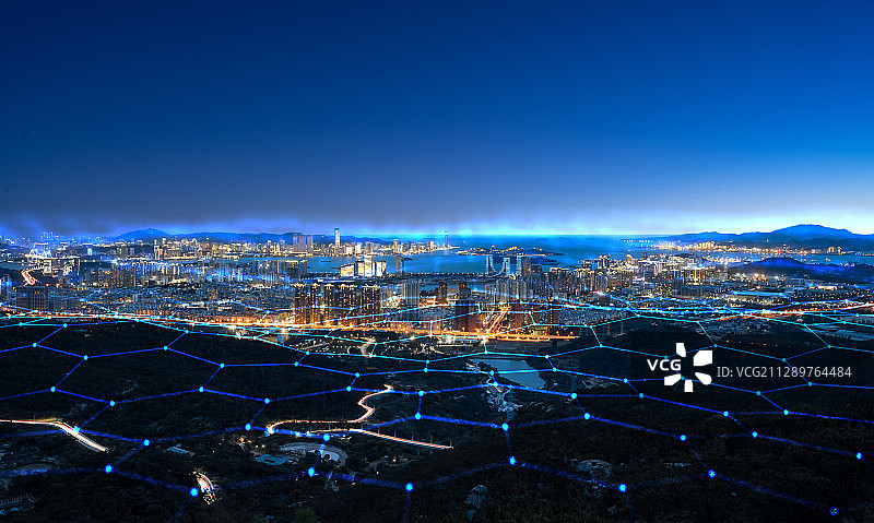 科技线条粒子合成的蓝调城市天际线图片素材