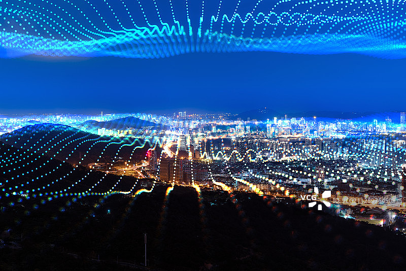 科技线条粒子合成的蓝调城市天际线图片素材