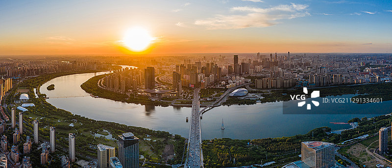 沈阳城青年大街浑河落日全景航拍图片素材