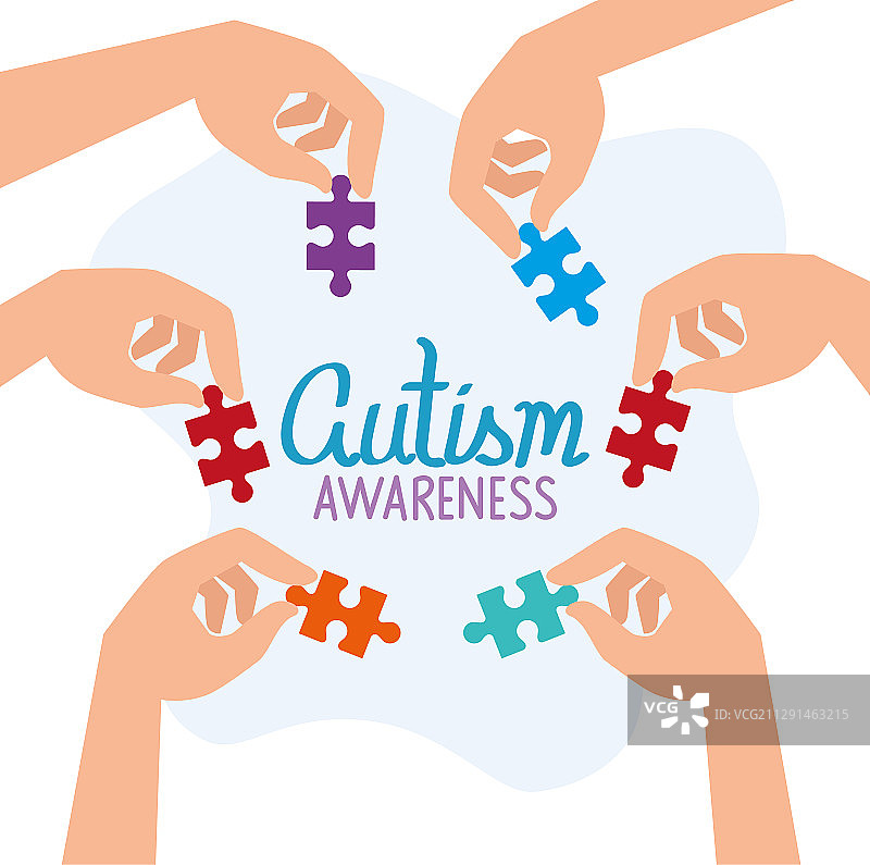 世界自闭症日：手与拼图图片素材