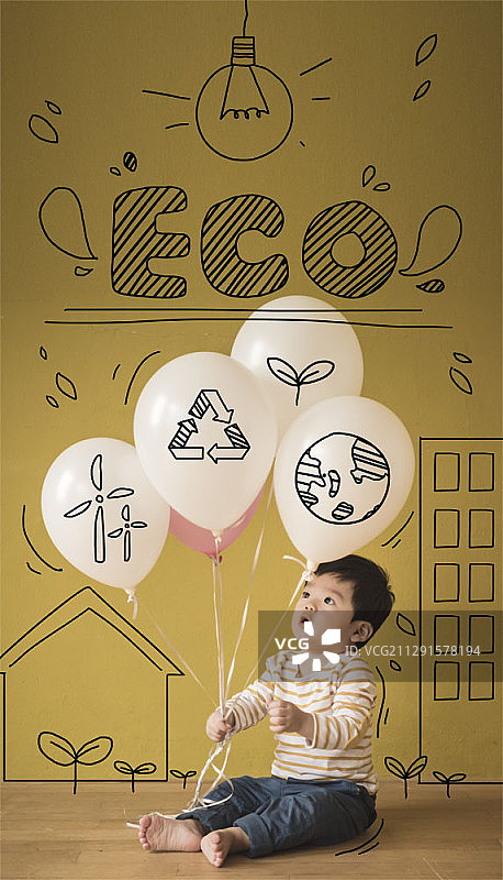 亚洲宝宝坐着拿气球的合成图像图片素材