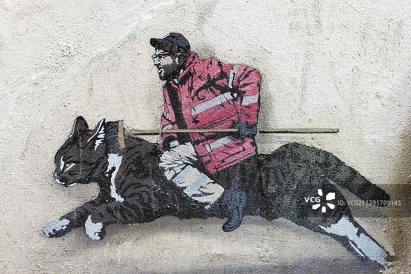 骑在猫身上的街道清扫车，城市清洁，布鲁塞尔街头艺术图片素材