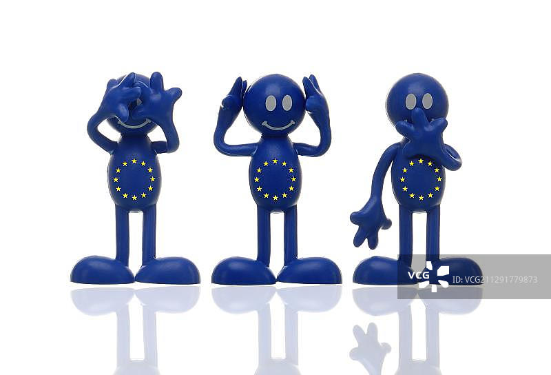 带有欧洲之星、欧洲旗帜的蓝色人偶：视而不见、听而不闻、闭口不谈，欧洲与欧元危机的象征性图像图片素材