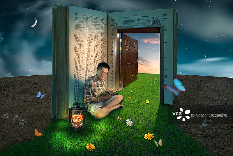男生在有魔力的书旁阅读形成荒漠绿洲图片素材