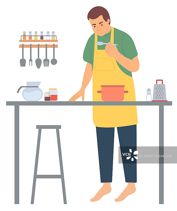 男人在厨房灶台上烹饪图片素材