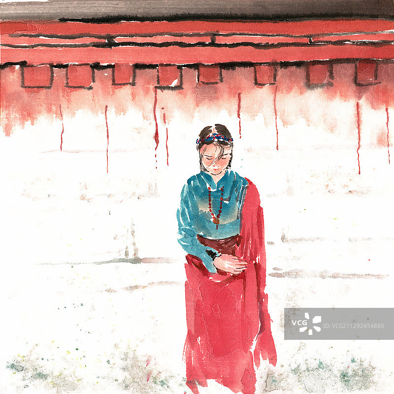 墙前的藏族女子图片素材
