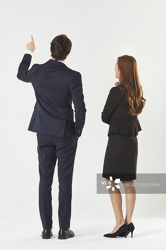 商务人士指向前方摄影作品图片素材