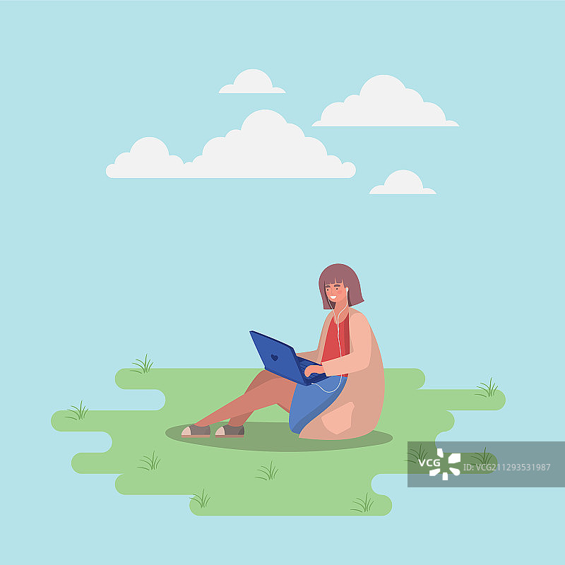 使用笔记本电脑设计的女孩图片素材