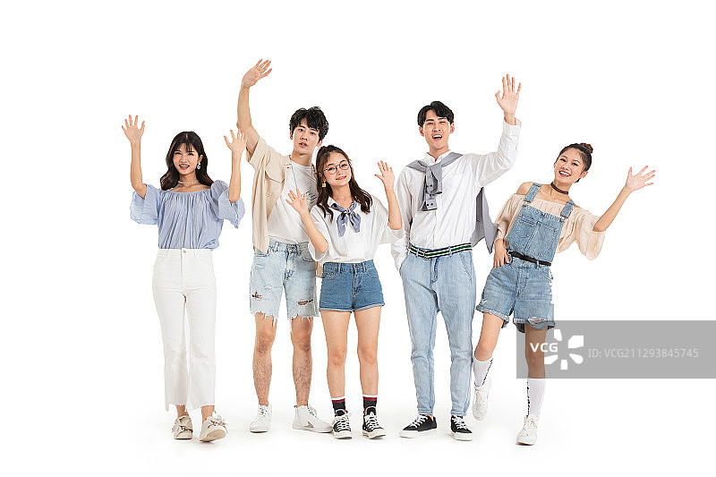 站立一排的青年男女挥手致意图片素材