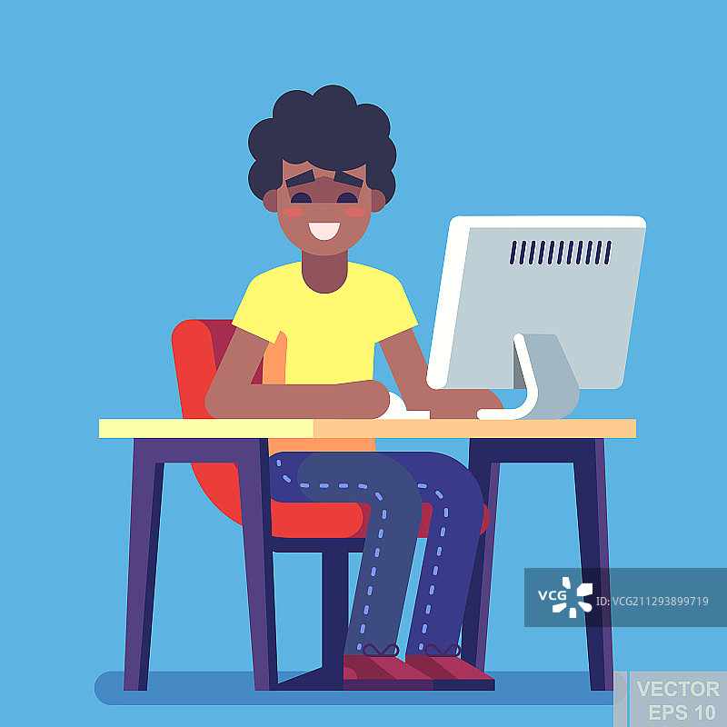 坐着打字的年轻英俊男人图片素材