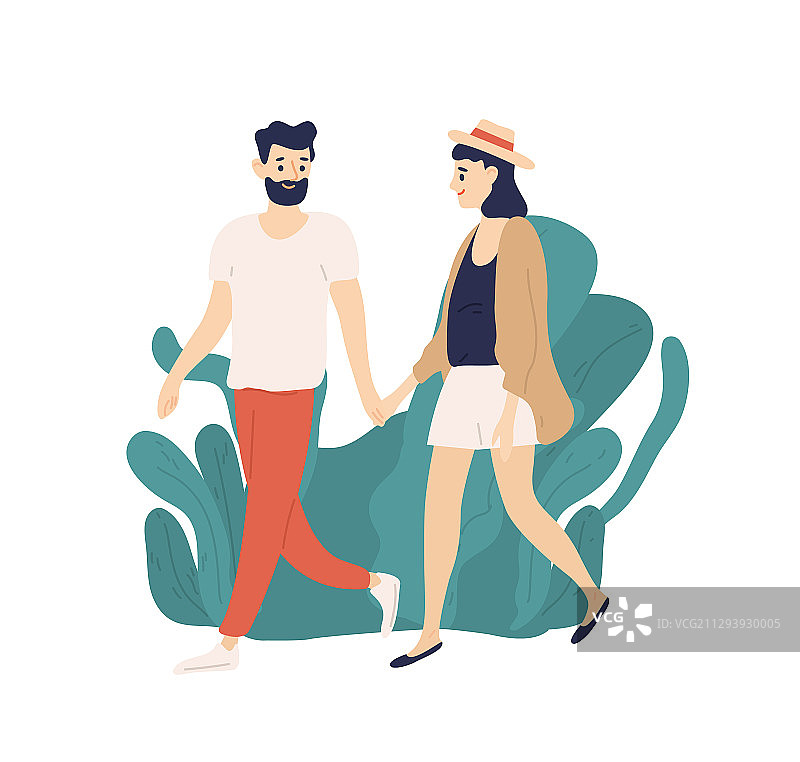 户外手牵手散步的年轻情侣图片素材