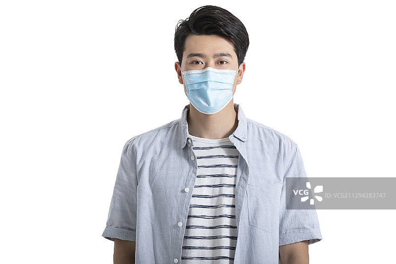 年轻男士戴医用口罩图片素材