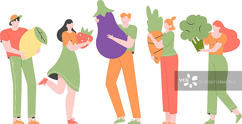 一群人拿着巨大的蔬菜和水果图片素材