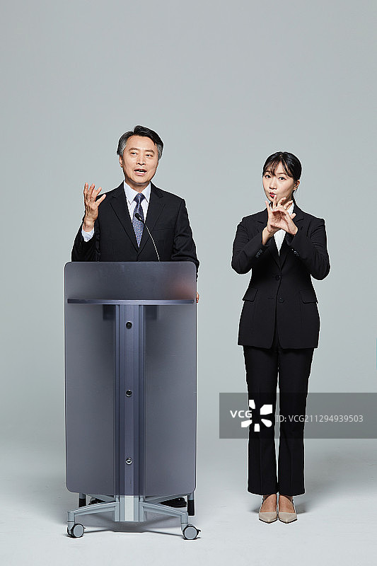 演示文稿，演讲，公开演讲者，对话，手语，听觉障碍图片素材