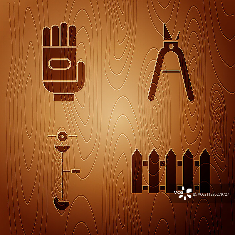 花园栅栏、木制园艺手套和草地图片素材