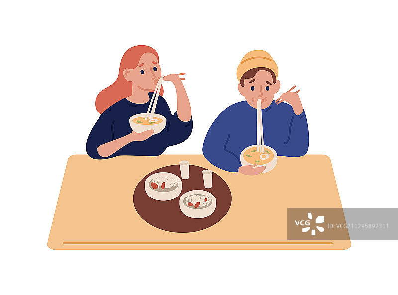 在餐厅吃面的时尚男人和女人图片素材