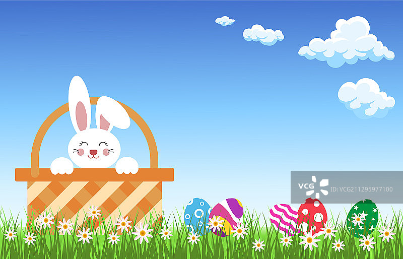 花草中抱着彩蛋的篮子里的兔子图片素材