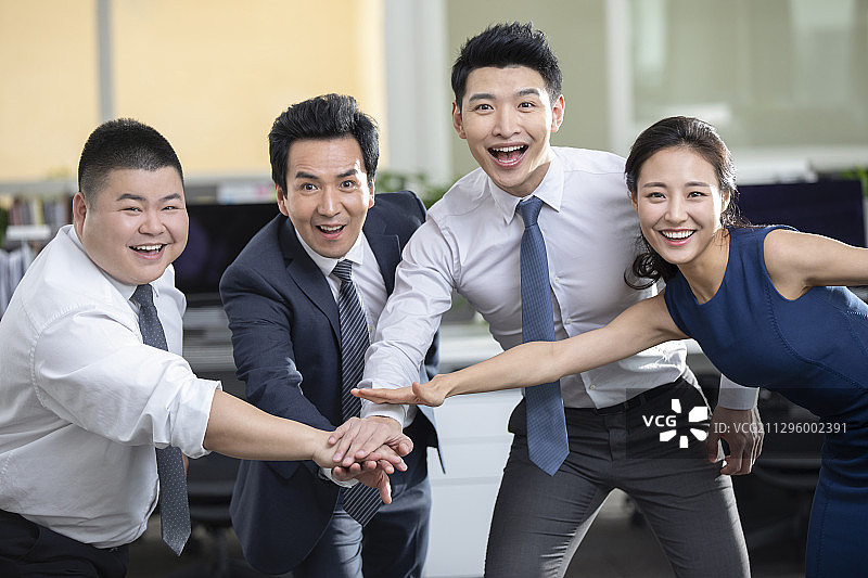 商务人士一起加油图片素材