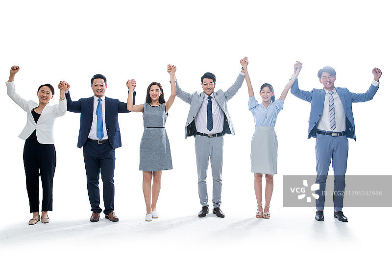 高举手臂的商务团队图片素材