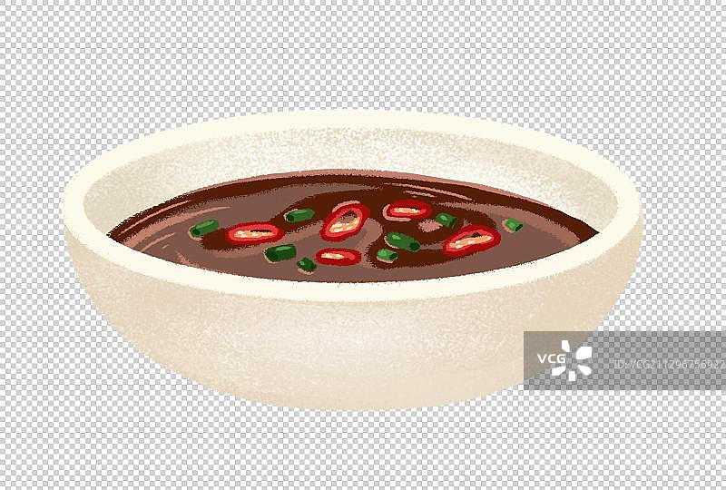 一个装着蘸料的碟子图片素材